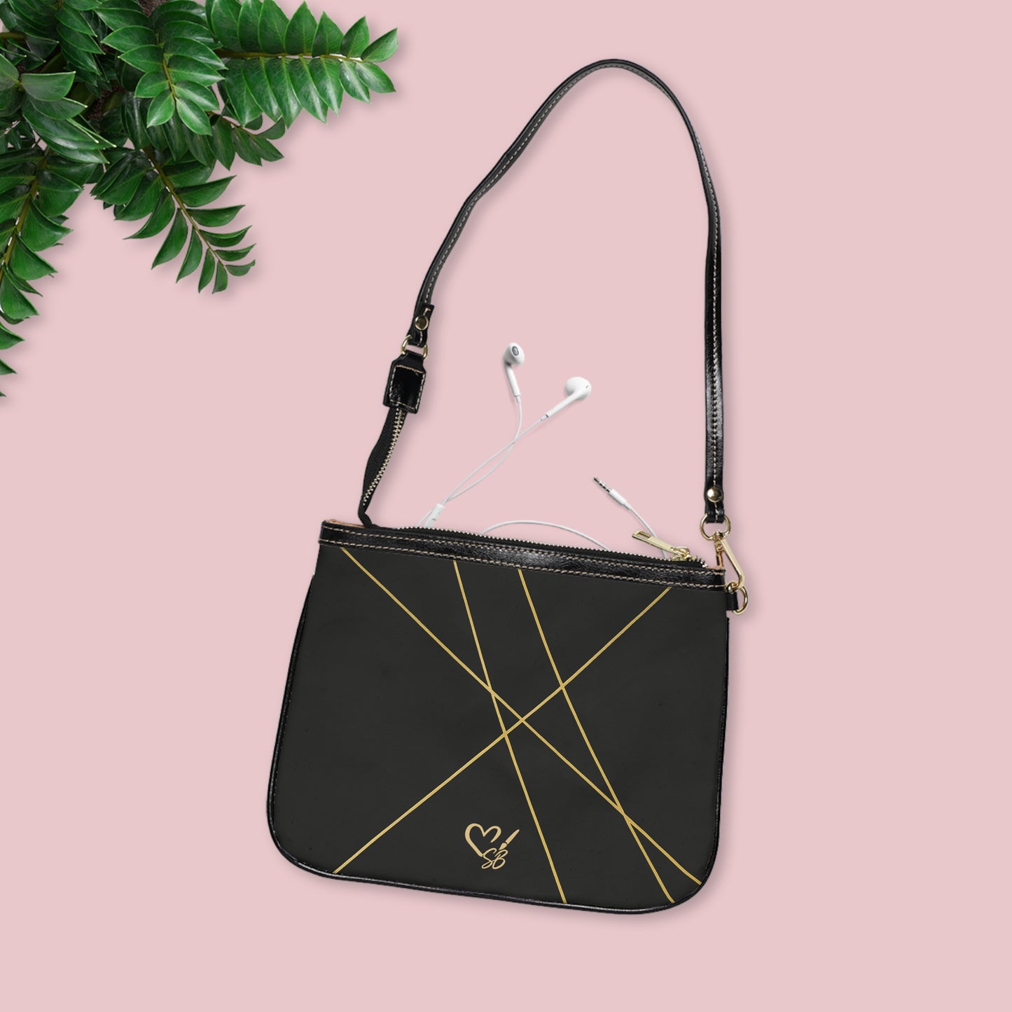 Michelle small shoulder bag lifestyle shot – minimal black PU leather crossbody with gold accent by the Soulful Brush