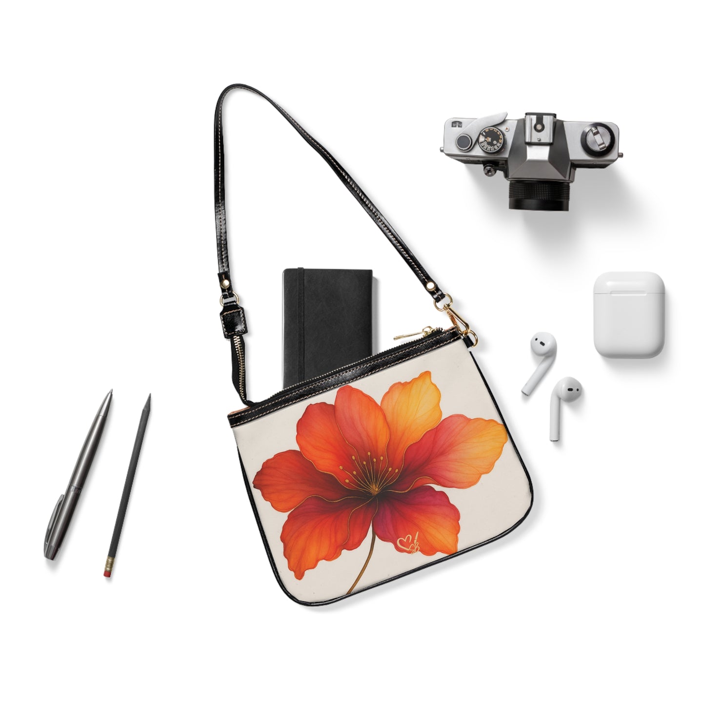 Bella crossbody bag flat lay – painterly orange hibiscus cream PU leather 10x8 shoulder purse by the Soulful Brush