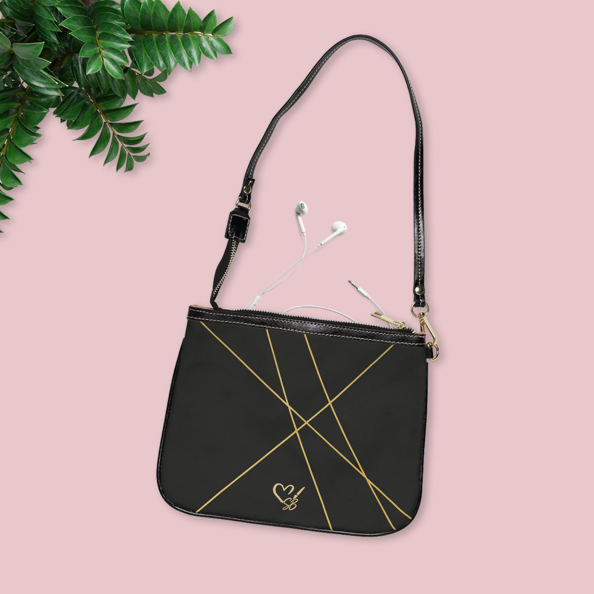 Michelle small shoulder bag lifestyle shot – minimal black PU leather crossbody with gold accent by the Soulful Brush
