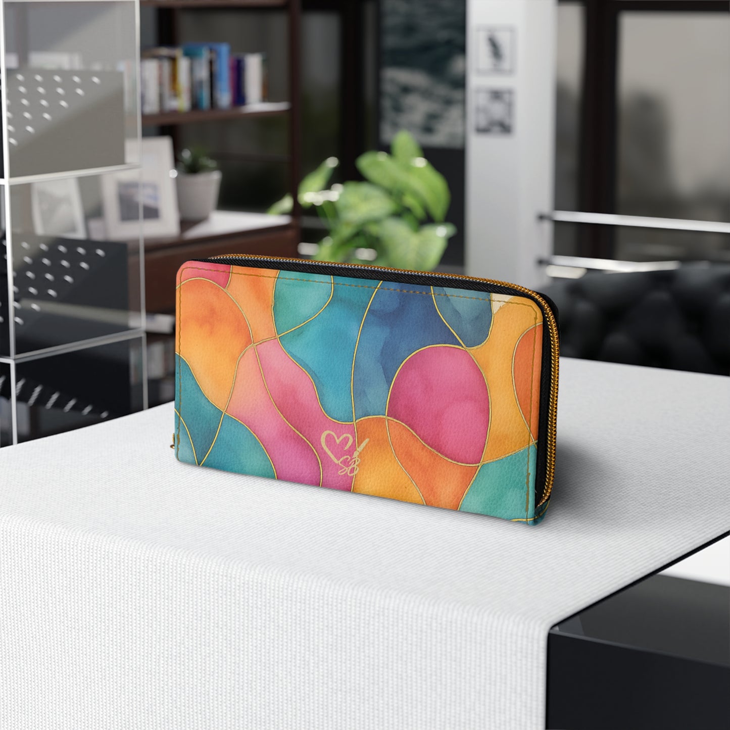 Vicky colorful abstract wallet angled view – stained-glass print PU leather zip-around with gold stitching by the Soulful Brush
