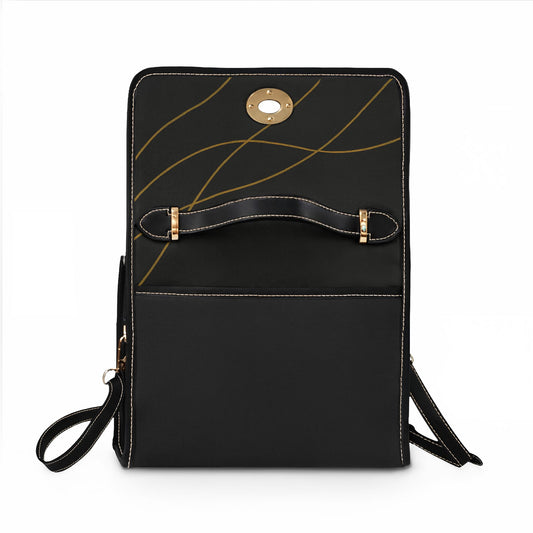 Bolso de lona impermeable — Bolso de mano minimalista negro y dorado con asa superior y correa cruzada