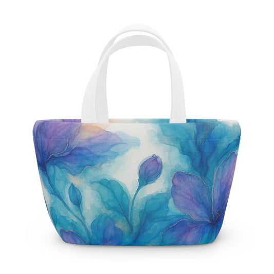 Blooms of the Day lunch bag with blue and violet printed flowers and buds on a pale background, with white handles.