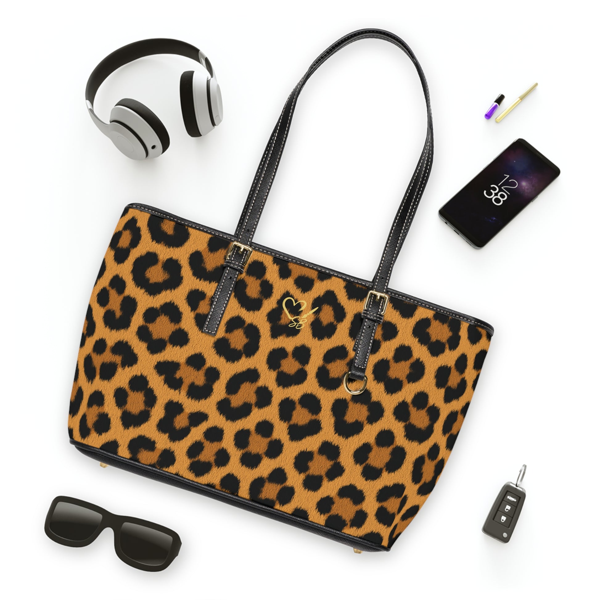 Leopard print PU leather shoulder bag flat lay – chic animal print everyday shoulder bag by the Soulful Brush
