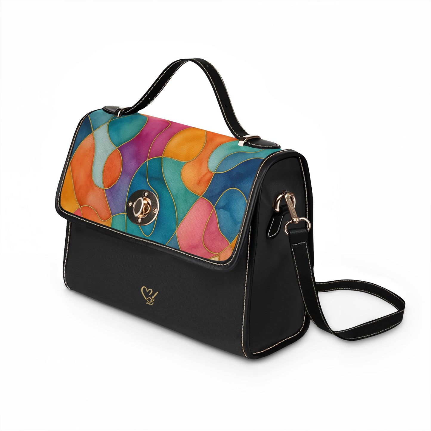 Vicky canvas handbag side profile – structured black body with colorful abstract watercolor flap and PU leather handles by the Soulful Brush
