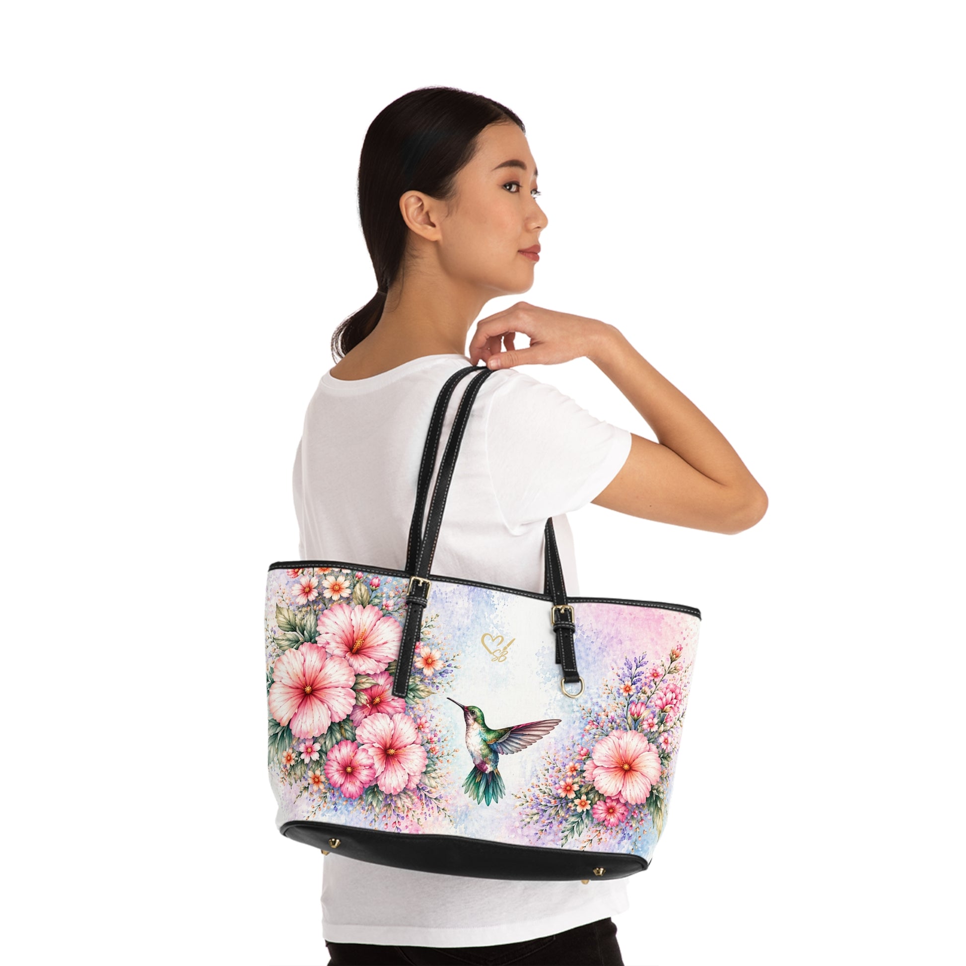 Lila Artisan Luxe PU leather shoulder bag 17x11 lifestyle shot – soft watercolor floral hummingbird wearable art tote by the Soulful Brush
