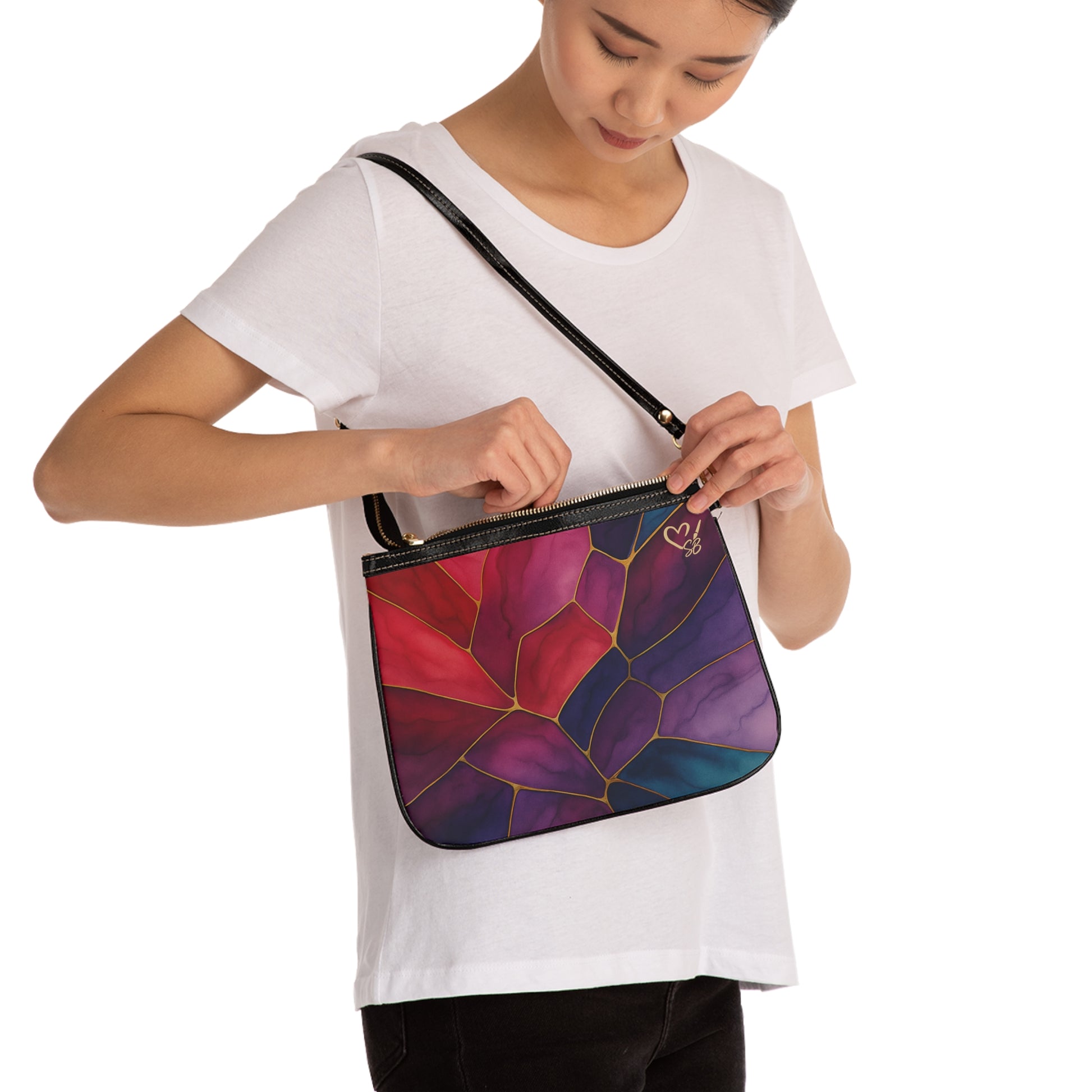 Shelby Artisan Luxe small shoulder bag lifestyle view – vibrant jewel-tone stained glass print compact crossbody by the Soulful Brush
