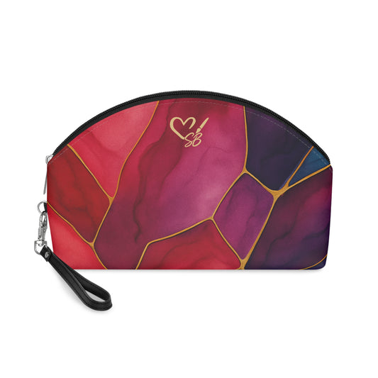 Shelby Artisan Luxe makeup bag front view – vibrant jewel-tone stained glass print cosmetic bag by the Soulful Brush
