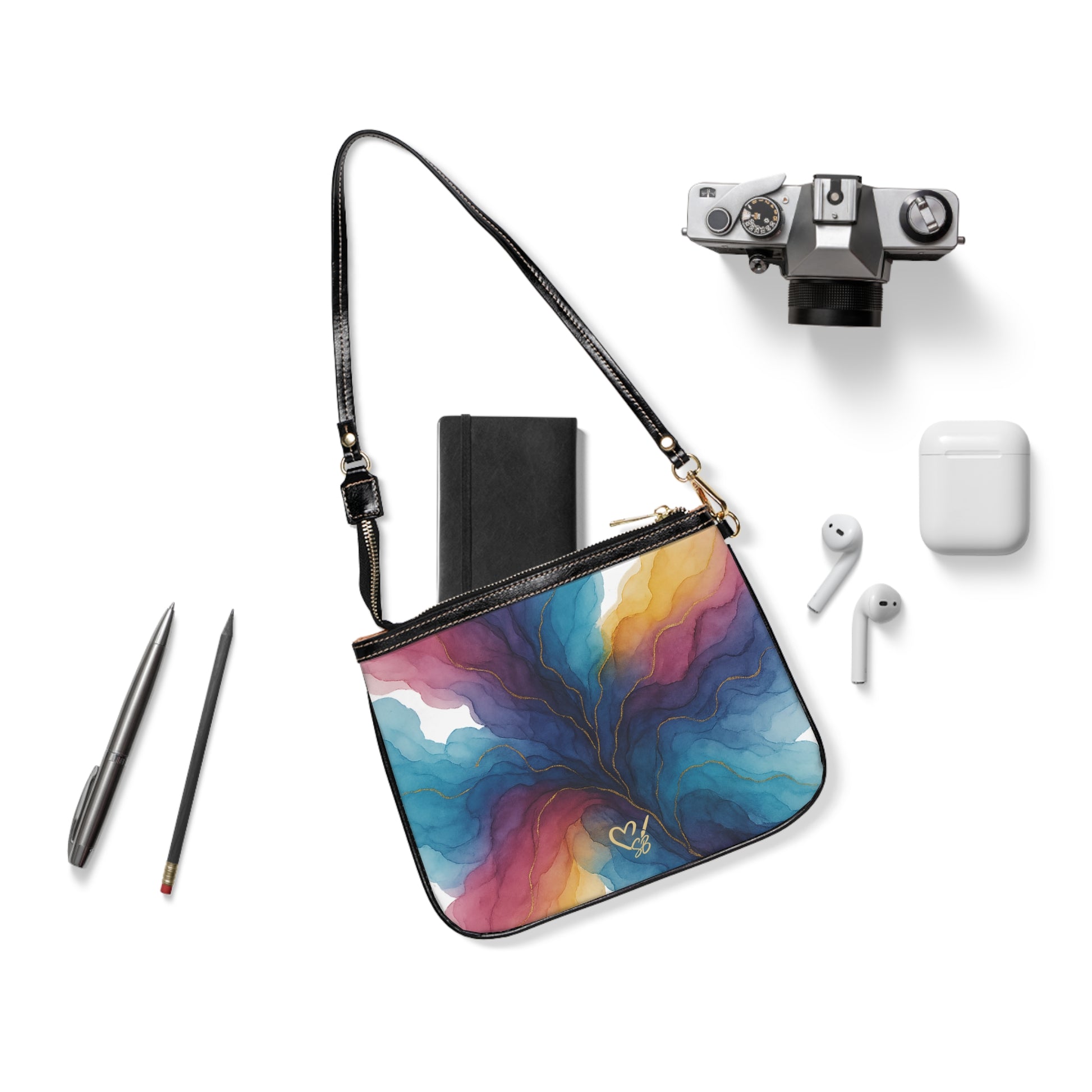 Gloria shoulder bag flat lay – colorful floral swirl PU leather small purse with gold-tone hardware by the Soulful Brush
