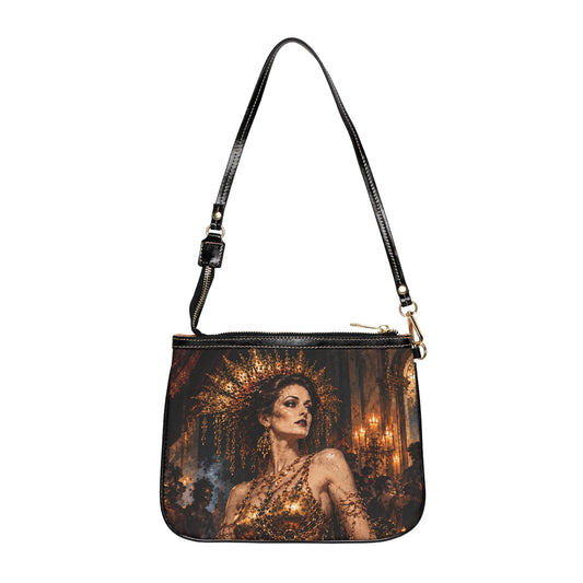 Front of The Gilded Queen small shoulder bag with black strap and artwork depicting a woman wearing an ornate gold crown.